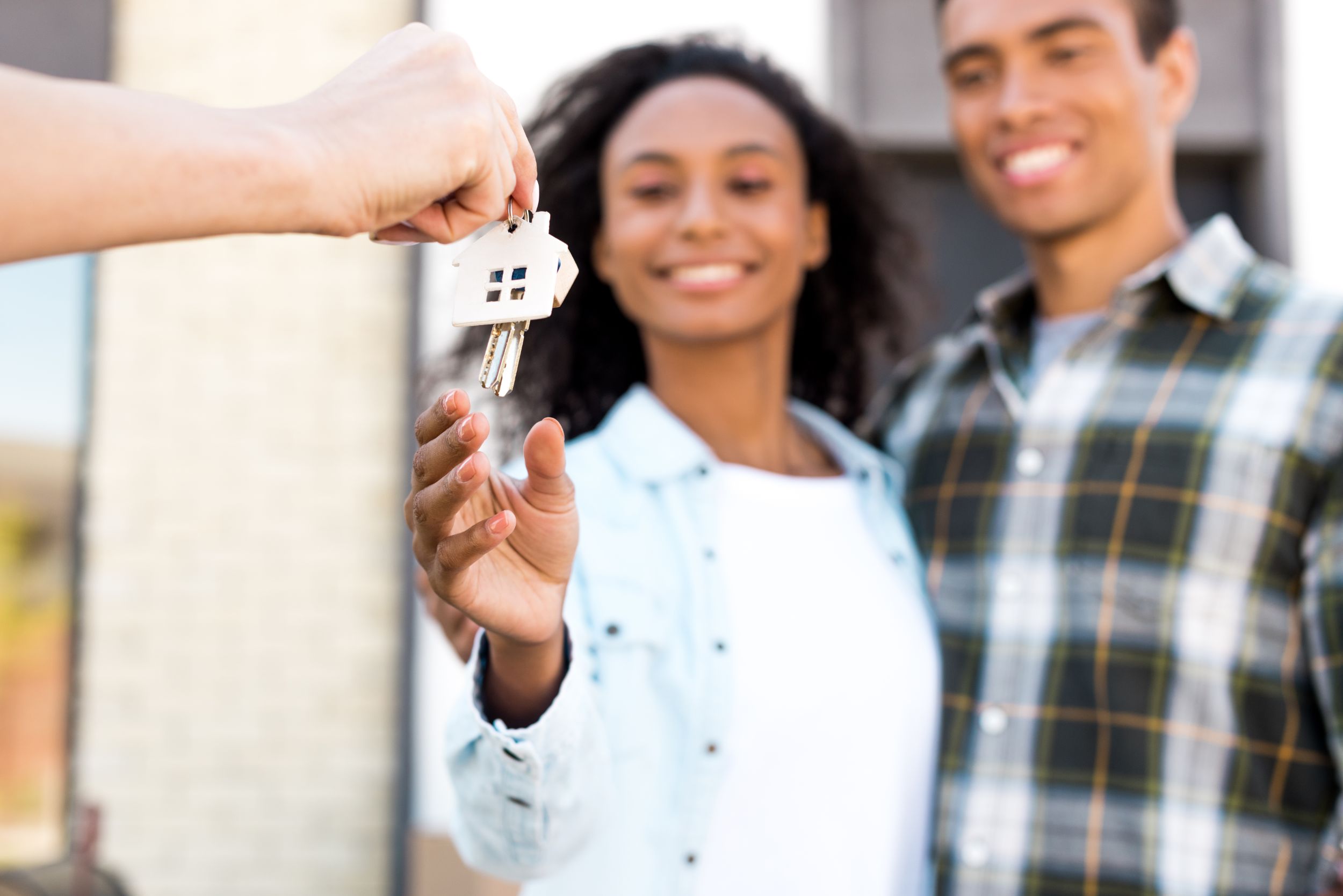 Couple Taking their New House Key